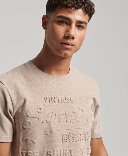 Men's Vintage Logo Embossed T-Shirt in Pastel Beige Snowy | Superdry US