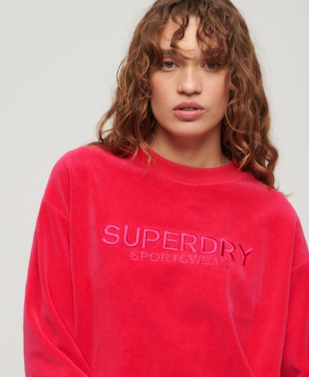 Superdry Damen Kastiges Velours-Sweatshirt mit Rundhalsausschnitt und Grafik Pink