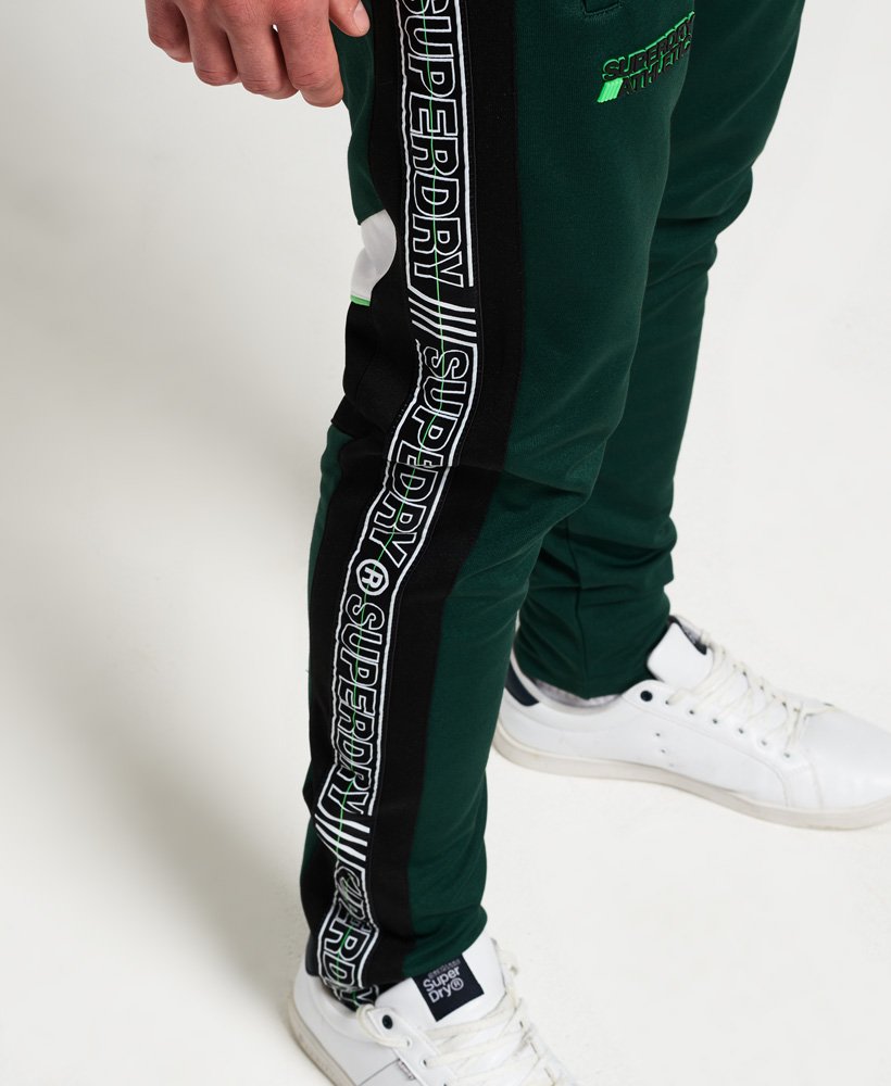 taped track pants