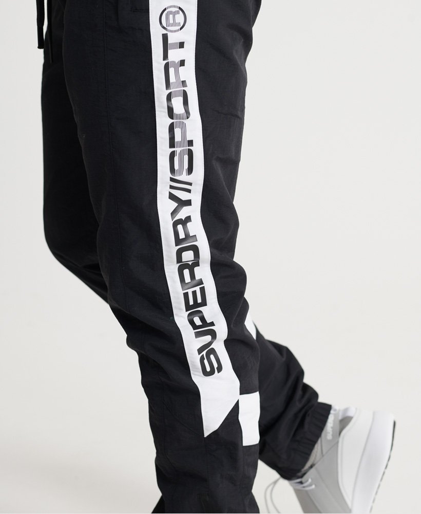 Mens - Tri Track Woven Joggers in Black | Superdry