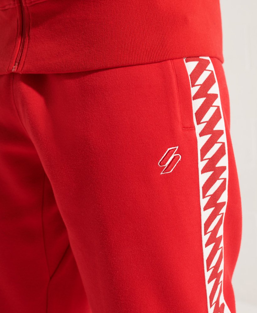 Mens - Code Tape Track Pants in Risk Red | Superdry