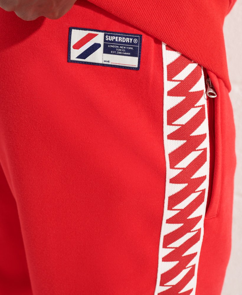 Mens - Code Tape Track Pants in Risk Red | Superdry