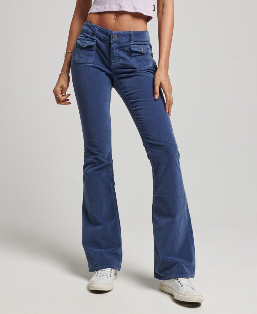 Women's Low Rise Velvet Flare Jeans in Mid Indigo Wash | Superdry