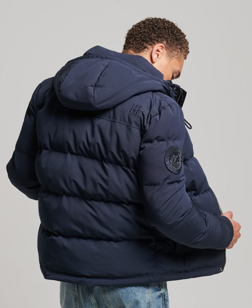 Hombre – Cazadora acolchada con capucha Everest en Azul Marino Cromo  Nórdico Superdry ES