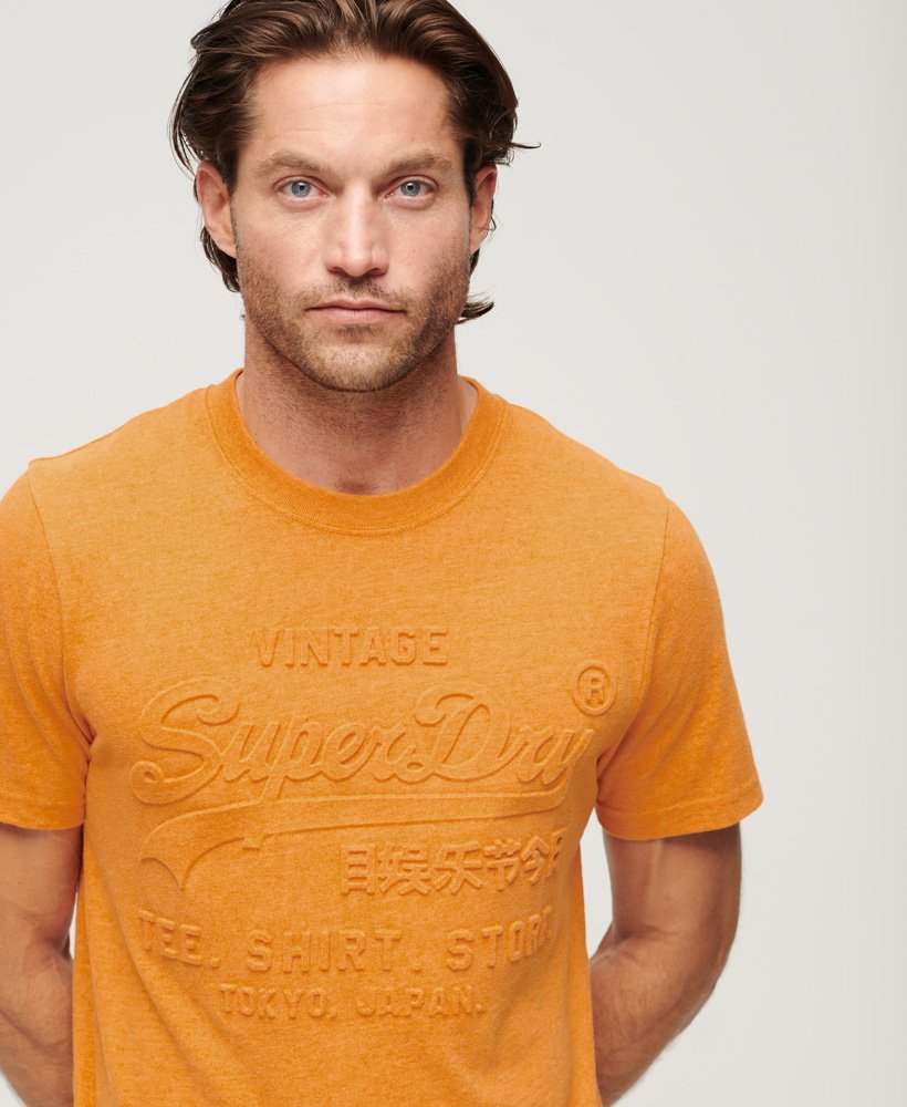 Men\'s Embossed Vintage Logo T-Shirt in Thrift Gold Marl | Superdry US
