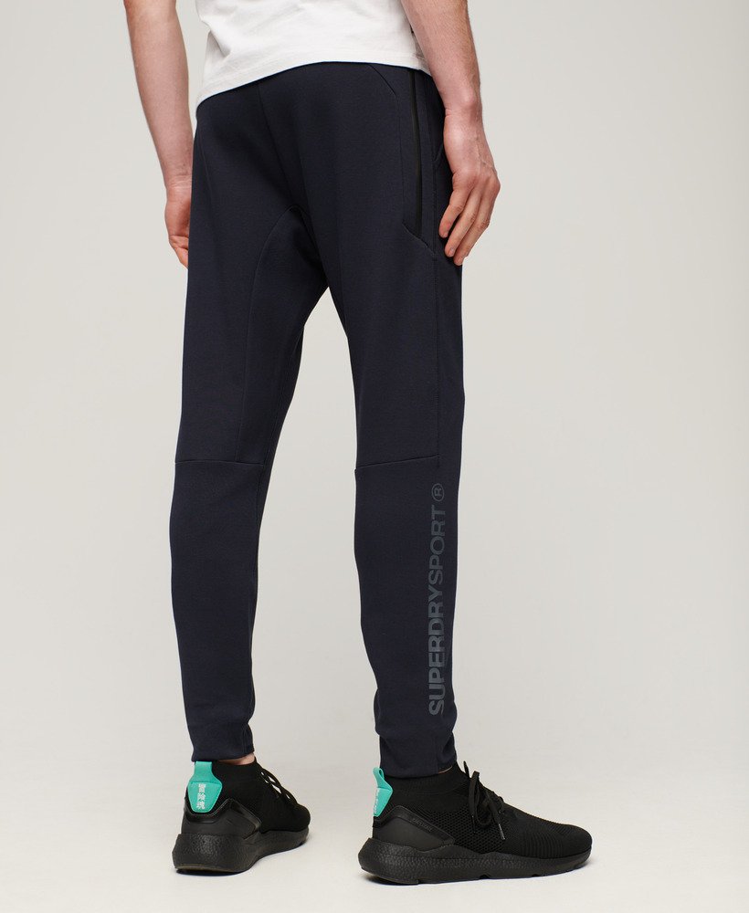 Mens - Sport Tech Logo Tapered Joggers in Eclipse Navy | Superdry